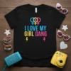 I LOVE MY GIRL GANG text design with interlocking female gender symbols in pink, blue, and yellow on a black