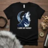 I LOVE MY HUSKY text with a constellation husky howling at the moon graphic on a black t-shirt