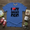 I Love My Short Mom t-shirt design with black bold text and a red heart graphic, featuring stick figures of