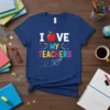 I Love My Teachers text with apple graphic on a blue t-shirt, perfect for educators and school staff