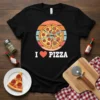 I Love Pizza t-shirt design with a vintage sunset circle graphic and pepperoni pizza slices