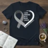 Grey ribbon and heart design with text "I Love Someone With Brain Cancer Awareness" on a dark navy t-shirt