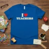 Blue t-shirt with "I Love Teachers" text and a red heart graphic, designed for educators