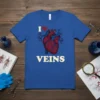 Blue t-shirt with "I Love Veins" text and a detailed anatomical heart graphic