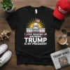 Black t-shirt with white text "I Love Waking Up Knowing Trump Is My President" and an illustration of the US