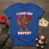 I Love You Bigfoot text with a Bigfoot character holding a bouquet of roses, on a blue t-shirt