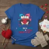I Love You A Little quote with cute penguins holding a yarn heart on a blue t-shirt, Valentine's theme