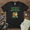 T-shirt with green text "I May Not Be Tall...But At Least I'm Slow" and a cartoon snail running, black shirt