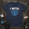 Navy blue t-shirt with white "I METAL" text above a blue cracked heart graphic