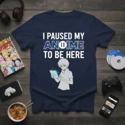 I Paused My Anime To Be Here text design with anime character holding a tablet, on a navy t-shirt