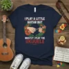 T-shirt with the text "I Play A Little Guitar But Mostly I Play The Ukulele" and a graphic of a