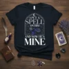 I Put A Spell On Him And Now He's Mine t-shirt with a witch holding a crystal ball and celestial