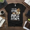 T-shirt with white text "I PUT THE STUD IN BIBLE STUDY" and a graphic of a cross and open Bible