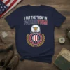 I Put The 'Tism' In Patriotism T-Shirt with an American eagle and flag emblem, navy blue graphic tee