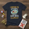 Navy t-shirt with bold yellow and white text reading "I REFUSE TO WITH PEOPLE WHO SHOULD HAVE BEEN Swallowed", featuring