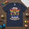 Navy t-shirt with "I Rock The Spectrum Autism World Tour" text and a rainbow phoenix graphic, symbolizing autism awareness