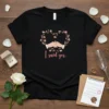 I said yes. t-shirt with floral heart and hands holding engagement ring, soft pink and white accents