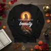 Islamic t-shirt with the quote "I saw nothing but beauty" and "Lady Zainab Peace Be Upon Her" in Arabic and