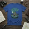 T-shirt featuring the phrase "I Saw The Loveland Frogman" above a cartoon illustration of a frogman standing by water under