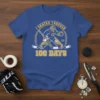 I SKATED THROUGH 100 DAYS text on a blue t-shirt with a hockey goalie graphic and yellow accents