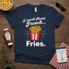I speak fluent French Fries t-shirt design with white text and a graphic of french fries in a red and