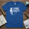 White text "I STAND CORRECTED" with a stick figure holding a pencil on a royal blue t-shirt