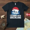 I Stand With Greenland t-shirt design with a polar bear on an ice floe against a red sun and blue