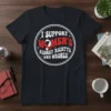 I Support Women's Kidney Rightts and Wrongs text with red ribbon graphic on a dark t-shirt