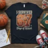 I Survived 67 Days of School text with basketball graphic on navy t-shirt
