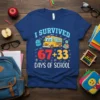 I SURVIVED 67+33 DAYS OF SCHOOL text with a cute school bus and backpack graphic on a navy blue t-shirt