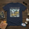 Navy blue t-shirt with bold white text "I SURVIVED MY TRIP TO NYC" above a cartoon scene of yellow taxis