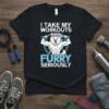 T-shirt with "I Take My Workouts Furry Seriously" text and a muscular cartoon dog lifting dumbbells, gym theme