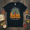 I teach the cutest pumpkins in the patch quote on a black t-shirt with a rainbow and pumpkin graphics