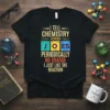 Black t-shirt with "I Tell Chemistry Jokes Periodically No Charge I Just Like The Reaction" text using periodic table elements
