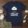 Navy blue t-shirt with white text that reads "I THINK I JUST SHARTED" above a cartoon cloud graphic with a