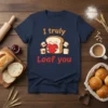 I Truly Loaf You t-shirt design featuring a cute loaf of bread holding a heart, surrounded by smaller bread slices