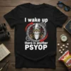 Black t-shirt with "I wake up there is another PSYOP" text and a cat wearing a hat, surrounded by gears