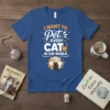 I Want To Pet Every Cat In The World quote with cute cat illustrations on a blue t-shirt
