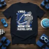 I Was 6 Now 7 Now I'm Level Up birthday t-shirt with racing flag graphics and bold text