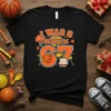 I WAS 6 NOW I'M 67 basketball birthday t-shirt with graphics of a basketball, hoop, and cake