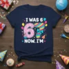 I WAS 67 NOW I'M birthday t-shirt with colorful numbers, cupcake, balloons, and party elements