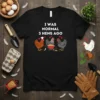 I Was Normal 3 Hens Ago funny chicken t-shirt with three cartoon hens and a wheelbarrow of feed