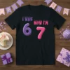 I WAS NOW I'M 67 birthday t-shirt design with purple 6 and pink 7 numbers