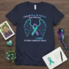 T-shirt with text "I Wear Teal & Purple For Someone I Miss Every Single Day" and teal/purple awareness ribbons with
