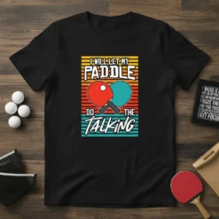 I Will Let My Paddle Do The Talking ping pong quote on a t-shirt with graphic of crossed paddles and