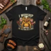 T-shirt with the text "I WORSHIP ALL THE PORK BELLY GODS" featuring cartoon pigs dressed as chefs and royalty holding