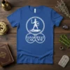 Blue t-shirt with IANAKIPIAZ CΑΚΑ WΦ text and a graphic of a rooster-headed warrior stepping on a fallen figure