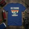 Ice Fishing Is My Therapy quote on a blue t-shirt with a vintage sunset graphic of a fisherman on a