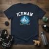 Iceman text above a graphic of icebergs, hockey sticks, and a puck on a navy t-shirt