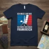 Navy blue t-shirt with white text 'Ich Muss Gar Nix Ich Muss Nur Nach Frankreich' and Eiffel Tower graphic